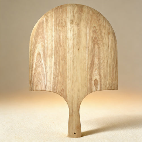 Personalized acacia wood pizza paddle engraved with a family name, 14 x 22 in