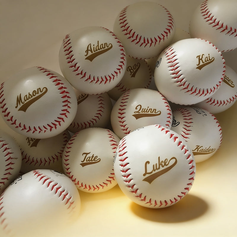 Custom engraved baseball keepsake gift showing monogram on white leather with red stitching