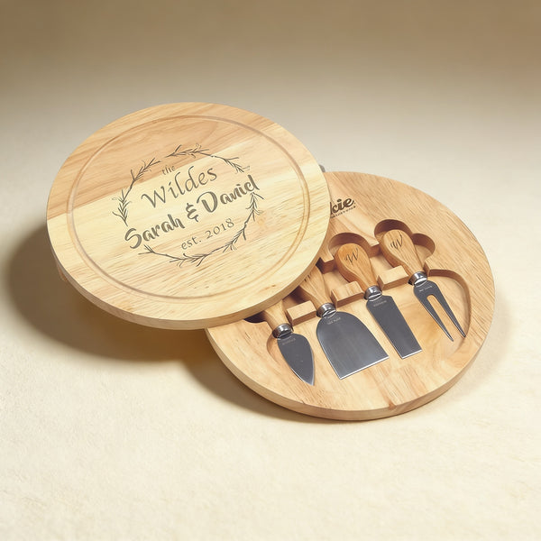 Custom engraved cheese board set with knife, fork, spreader, and slicer, laser engraving on natural wood grain