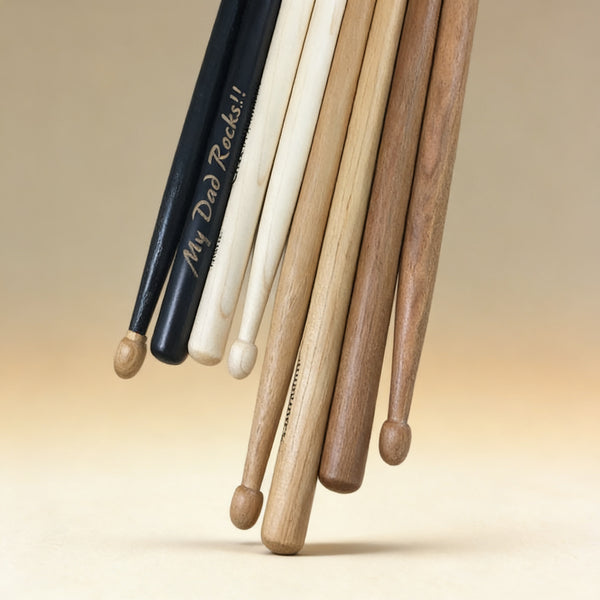 Personalized hickory drumsticks engraved with a name, 5A profile, natural wood finish