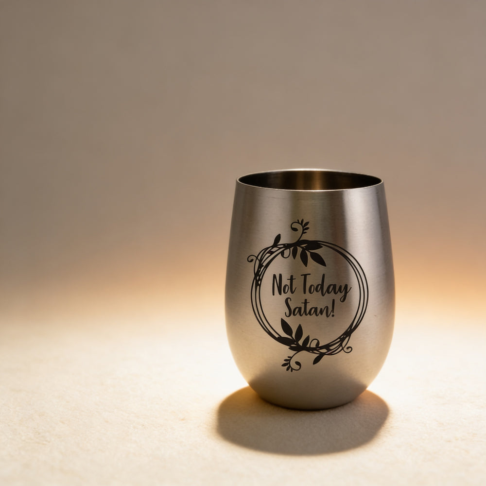 Personalized stemless stainless steel wine goblet engraved with a name, brushed finish