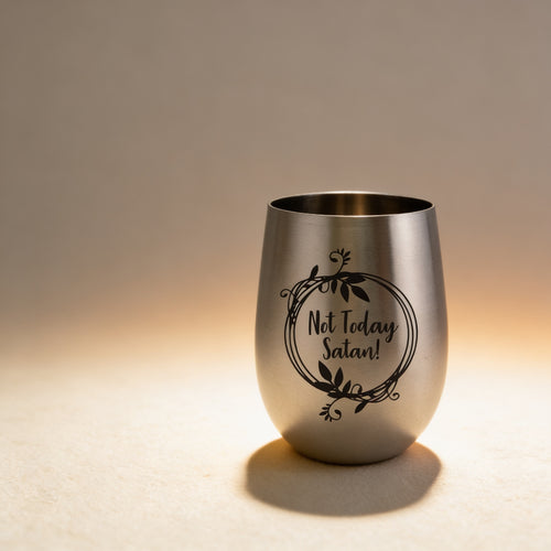Personalized stemless stainless steel wine goblet engraved with a name, brushed finish