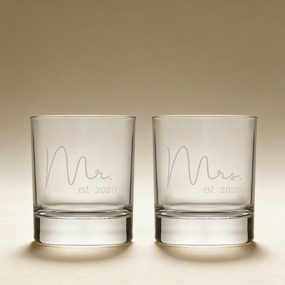 Custom engraved whiskey glass with a name and date, laser etched on glass