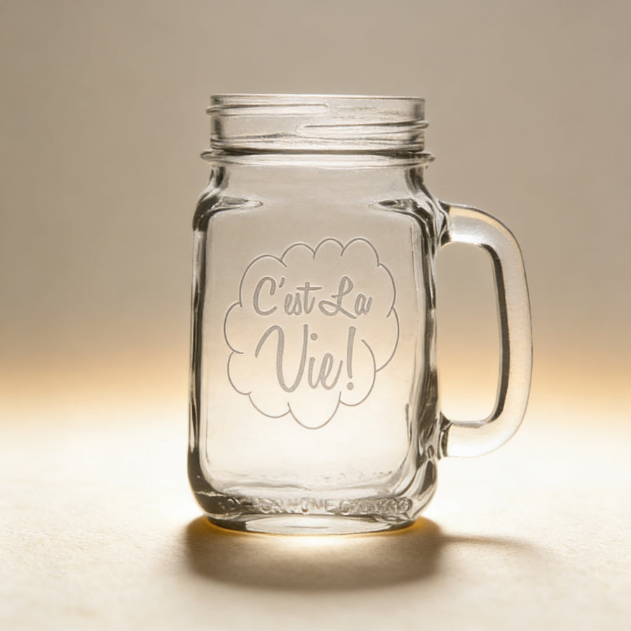 Personalized mason jar mug engraved with a name and date, 16 oz clear glass with handle