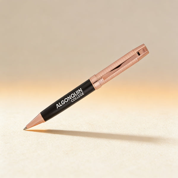 Personalized rose gold pen engraved with a name in light silver, black trim twist-action barrel