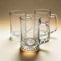 Custom engraved 15 oz. sports beer mug with laser-etched text, clear glass
