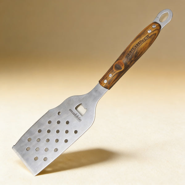 Personalized BBQ spatula engraved with a name on the wooden handle, heavy-gauge stainless steel blade