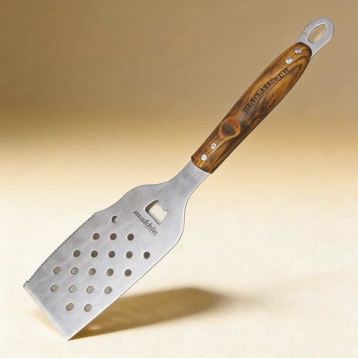 Personalized BBQ spatula engraved with a name on the wooden handle, heavy-gauge stainless steel blade