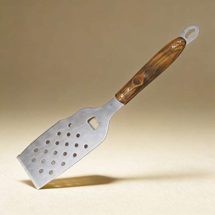Custom engraved grill spatula with bottle opener and serrated edge, natural wood handle close-up