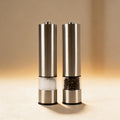 Personalized automatic pepper mill engraved with a monogram, brushed stainless steel body