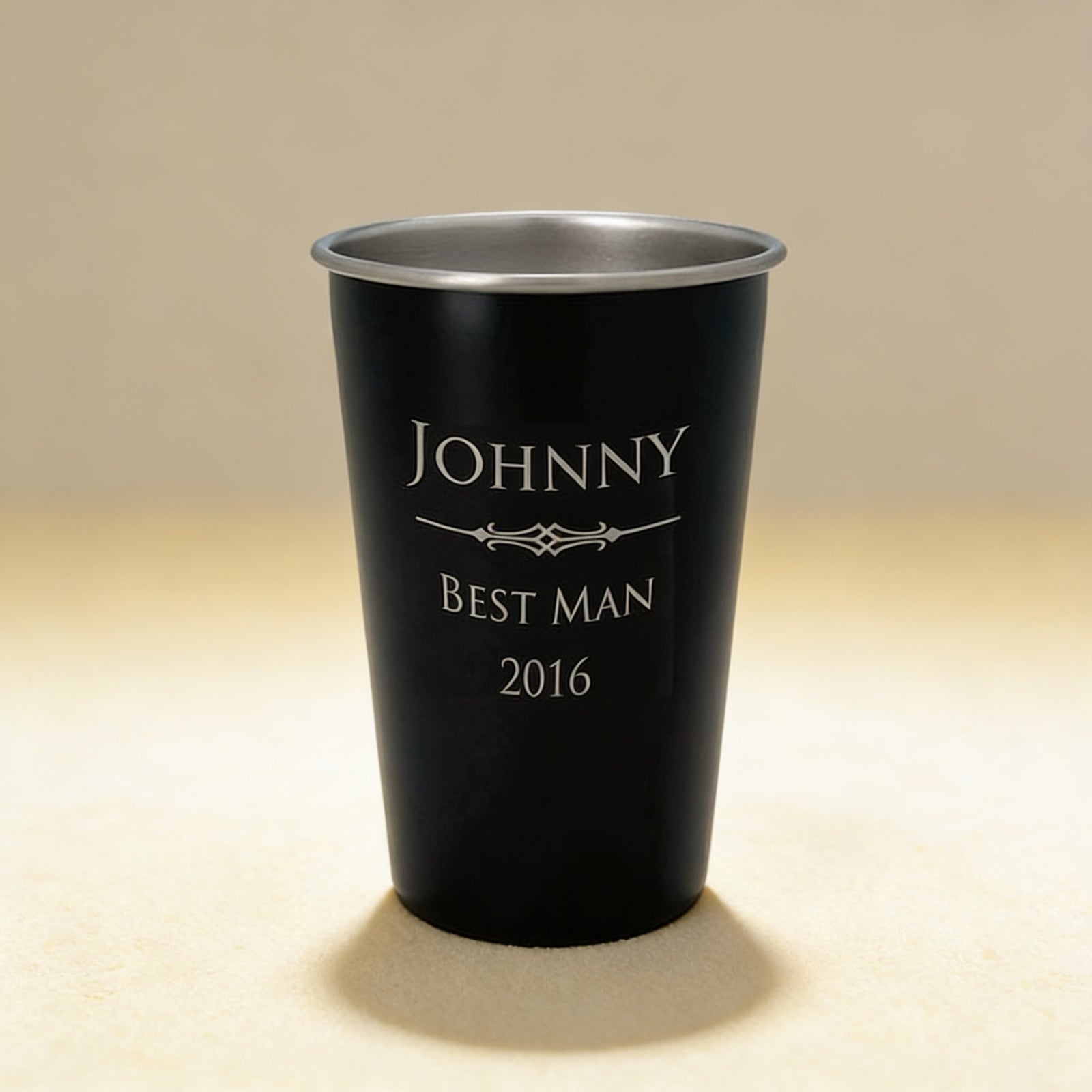 Personalized stainless steel pint glass engraved with a name, 16 oz silver finish