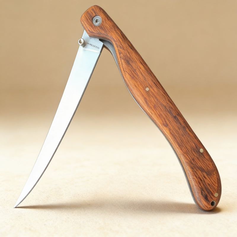 Folding fillet knife with lock-back safety and engraved rosewood handle, shown fully extended at 13 inches