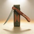 Custom engraved folding fillet knife closed, rosewood handle with laser-engraved initials