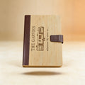 Custom engraved bamboo journal open to lined recycled paper pages, sustainable stationery gift