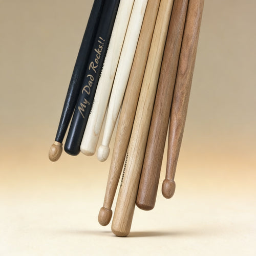 Personalized hickory drumsticks engraved with a name, 5A profile, natural wood finish