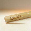 Custom engraved mini baseball bat with swoosh design and name, natural wood finish