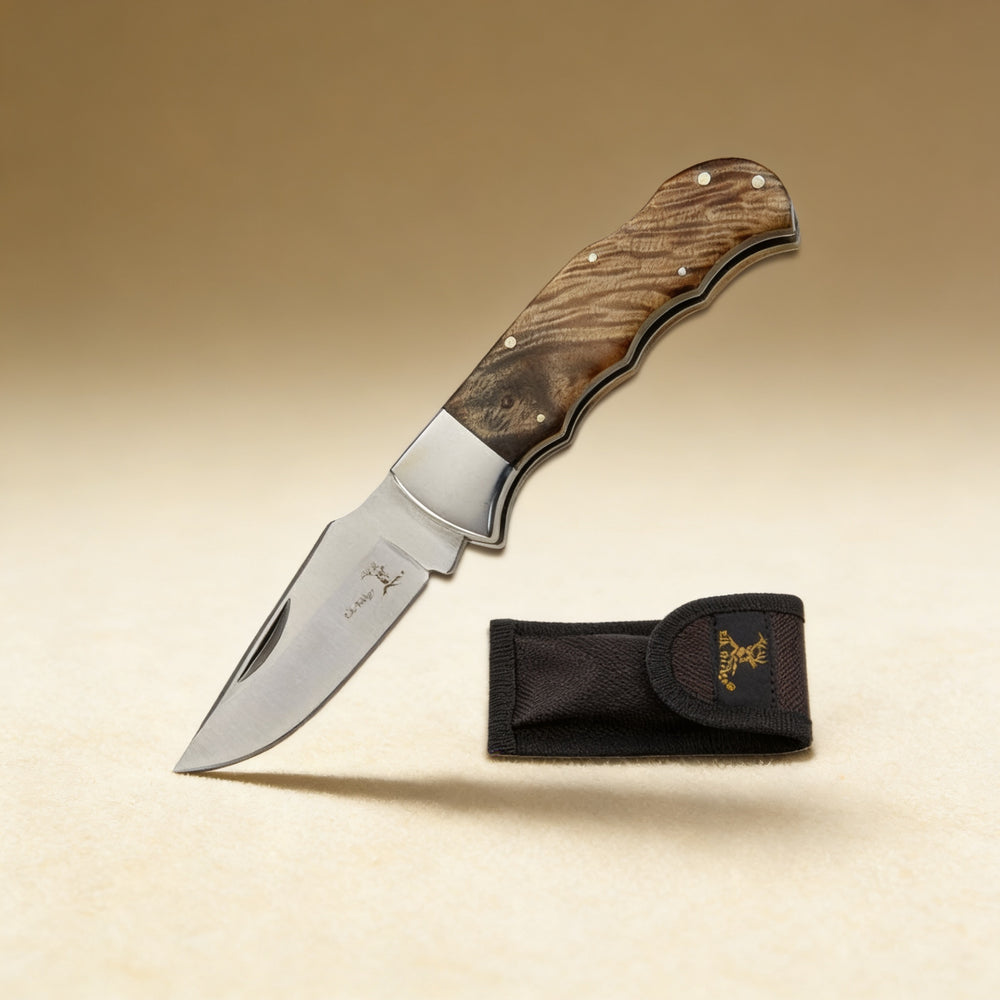 Personalized gentlemen's pocket knife engraved with a name on the handle, stainless steel blade
