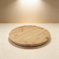 Laser engraved bamboo lazy susan on a set dining table, personalized housewarming gift