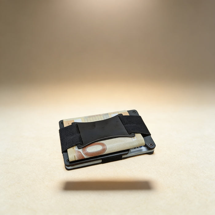Gunmetal aluminum minimalist wallet with custom laser-engraved name, front view