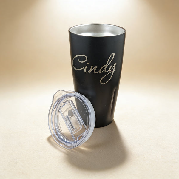 Personalized vacuum insulated tumbler engraved with a name, 20 oz powder-coated stainless steel in black