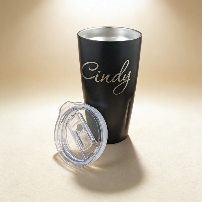 Personalized vacuum insulated tumbler engraved with a name, 20 oz powder-coated stainless steel in black