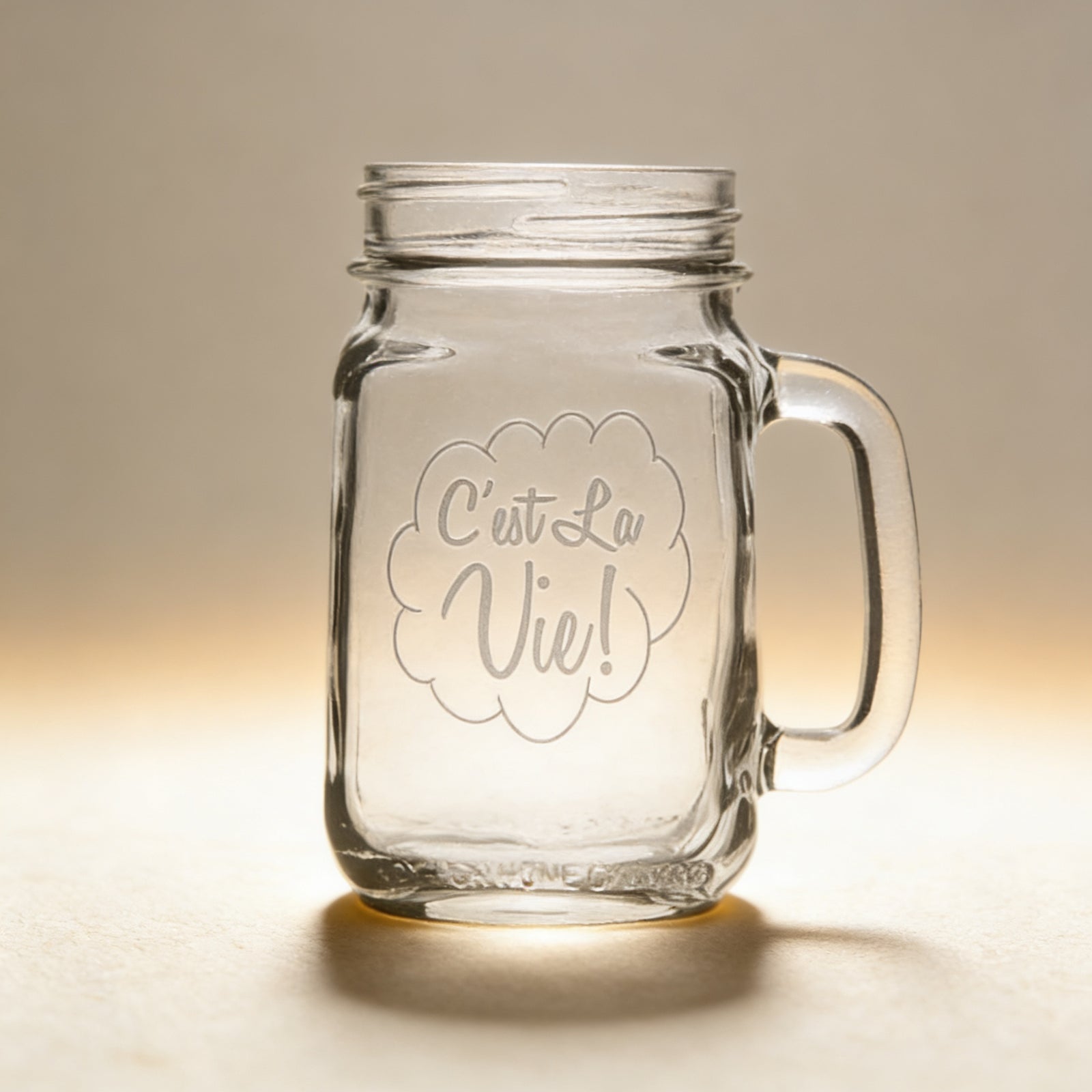 Personalized mason jar mug engraved with a name and date, 16 oz clear glass with handle