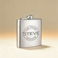 Matte black hip flask engraved with initials, shown with rosewood gift box and shot glass set